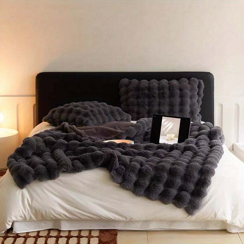 Decorate your home with this soft and comfortable plush blanket - the touch of lying on clouds