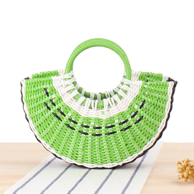 Colorful fruit handbag in cute semi-circular shape. Handmade PVC woven beach straw bag