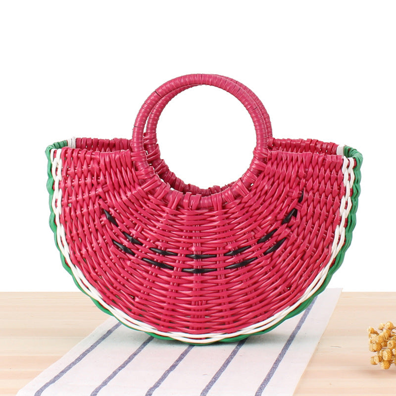 Colorful fruit handbag in cute semi-circular shape. Handmade PVC woven beach straw bag