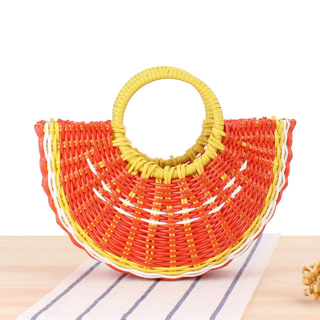 Colorful fruit handbag in cute semi-circular shape. Handmade PVC woven beach straw bag